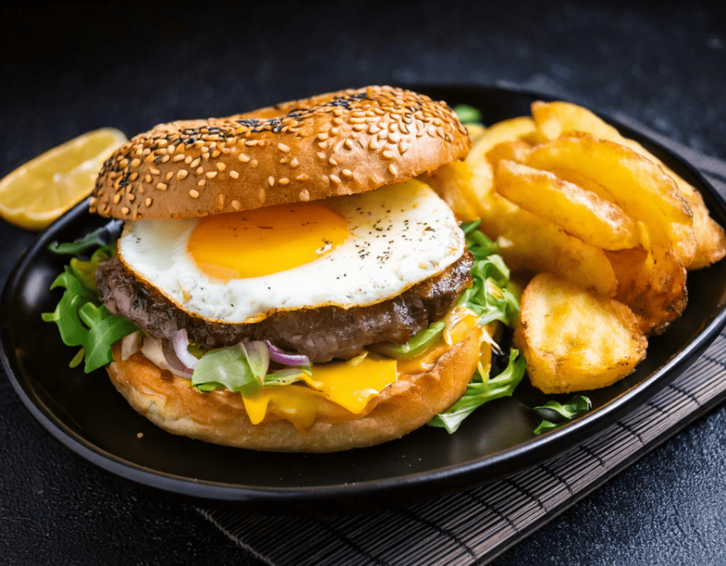 Steak Egg and Cheese Bagel with fries