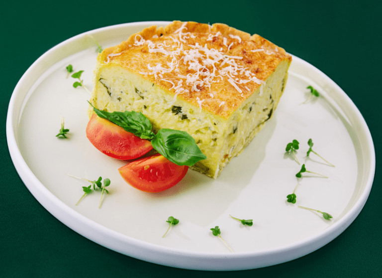 cottage cheese egg bake​ slice on plate