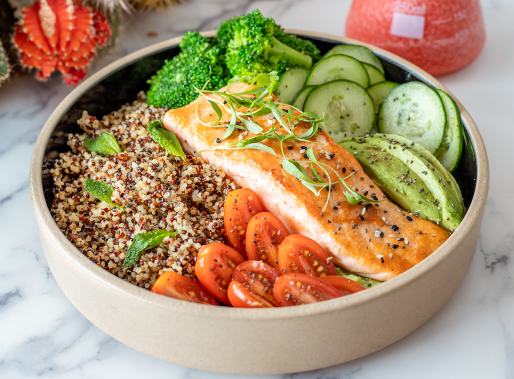 plate-of-salmon-with-quinoa-and-raw-vegetables